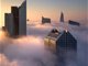 美摄影师拍摄迪拜摩天大楼云雾中“漂浮”